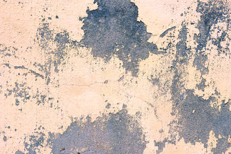 Yellow wall with cracks  の写真素材