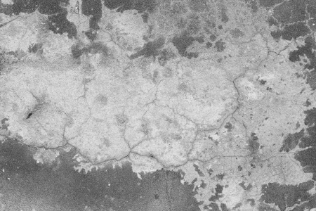 Grey wall background. Old concrete wall with cracks.の写真素材