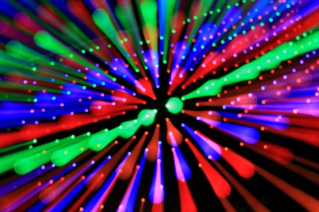 Colorful rays of light. Beautiful abstract background in blue, green and red tones  representing speed and action.の写真素材
