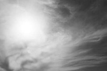 Dark sky with sun  The grey stormy clouds  の写真素材