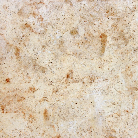 Natural granite. Seamless yellow granite. の写真素材