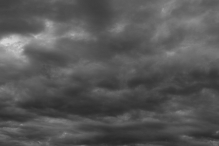 Dark clouds  The stormy clouds over horizon  の写真素材