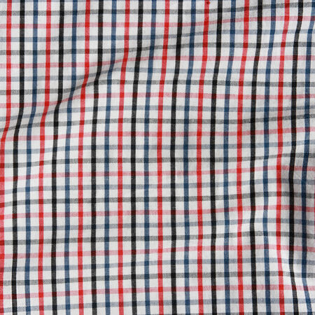 Texture of a red and white checkered picnic blanket  Striped crumpled tablecloth の写真素材