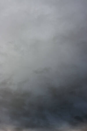 Rainy clouds. Stormy clouds over horizon.の写真素材