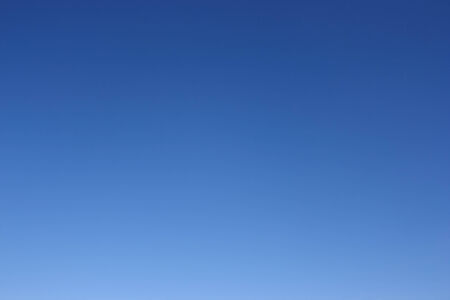 Only clear blue sky. Sky as gradient or background.の写真素材