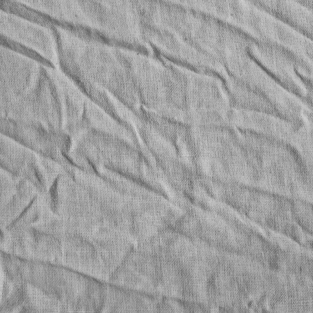 Gray canvas texture with delicate striped pattern. Natural cotton canvas.の写真素材