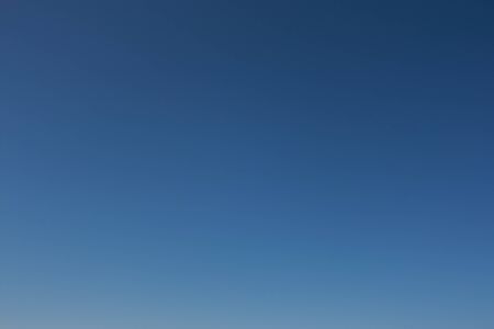 Sky as background. Clear blue sky without clouds.の写真素材