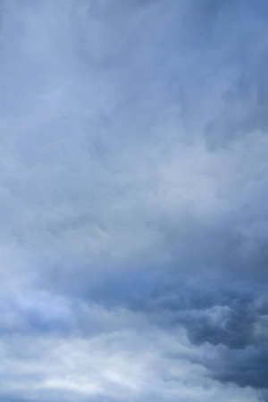 Rainy clouds over horizon. Storm sky background.の写真素材