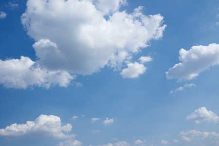 Big and small clouds over horizon. Blue sky and clouds.の写真素材