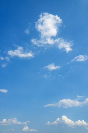 Blue sky and white clouds over horizon.の写真素材