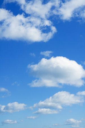 Blue sky and white clouds over horizon. Heaven.の写真素材