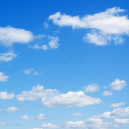 Cloudscape over horizon. Heaven. Blue sky and white clouds.の写真素材