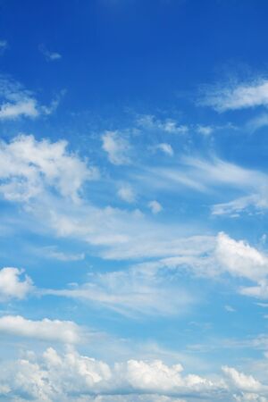 Blue sky and clouds. Beautiful cloudscape over horizon.の写真素材