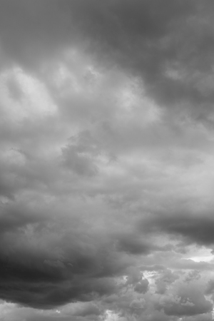 Storm sky, rain. Thunderclouds over horizon, dark, gray.の写真素材