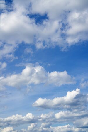 Blue sky and white clouds. Cloudscape over horizon.の写真素材