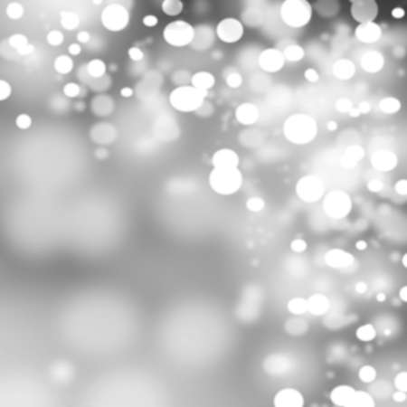 Lights on grey background, sparkles. Beautiful shine of a holiday light.の写真素材