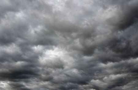 Storm clouds over horizon. Cloudy sky before a thunderstorm.の写真素材