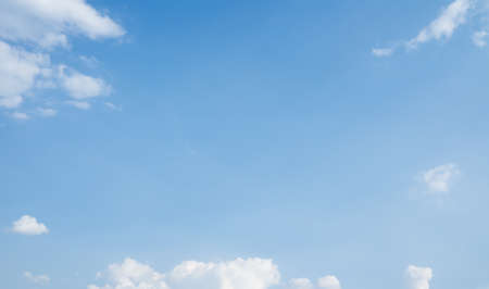 Transparent white clouds and blue sky. Clouds against blue sky over horizon.の写真素材