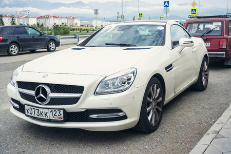 Sochi, Russia - October 11, 2016: New white sport Mercedes Benz SLK parked on the street of Sochi.のeditorial素材