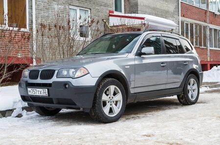Smolensk, Russia - November 13, 2016: BMW X3 parked in winter near the house.のeditorial素材