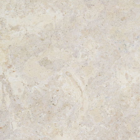 Granite stone wall background. Beautiful beige granite background with natural pattern.の写真素材