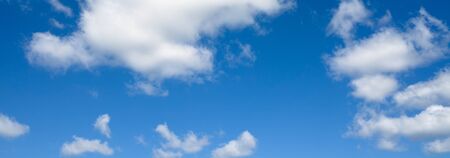 Beautiful white clouds flying against blue sky. Light blue sky with clouds.の写真素材