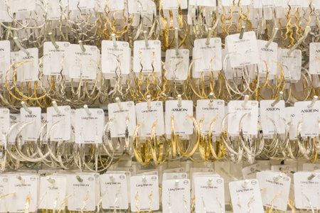 Istanbul, Turkey - 13, March 2022: gold and silver jewelry in a jewelry store.のeditorial素材