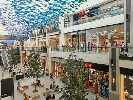 Belgrade, Serbia - July 16, 2024: Elegant shopping mall, biggest in Serbia. People walking in shopping mall centre.の写真素材