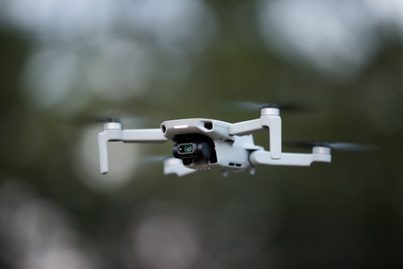 quadcopter in flight on a green background