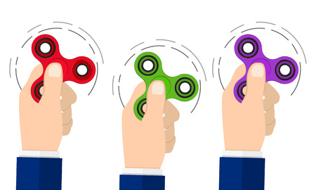 Colorful hand fidget spinner toys isolated on white background - it relieves stress, three-dimensional rendering,のイラスト素材