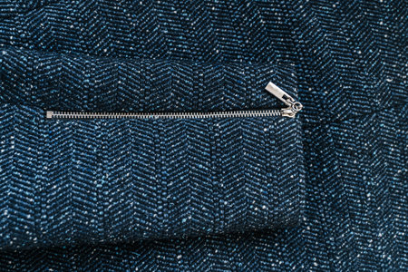 The texture of the fabric sleeve close-up. Blue fabric