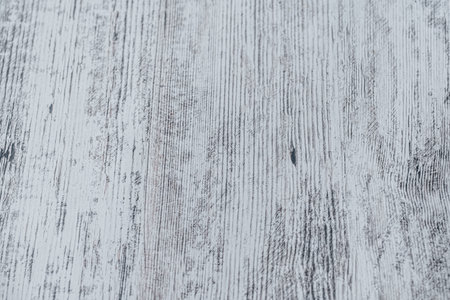 Light wood texture close-up from above. Gray texture with brown shades
