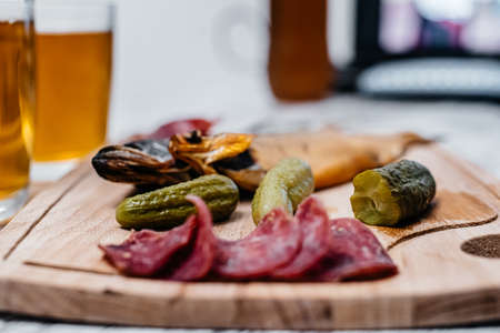 beer snacks on a wooden Board. Side viewの写真素材