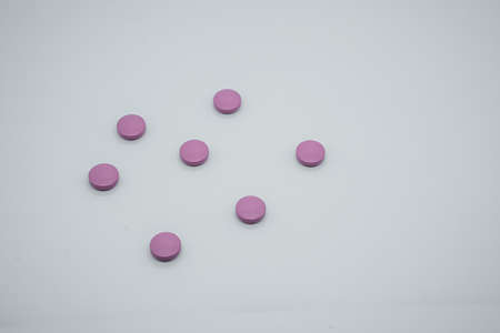 Pills on a light background close up. View from aboveの写真素材