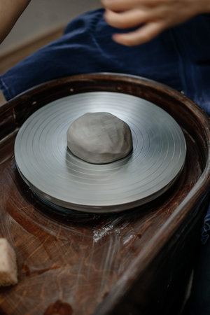 Clay on a potter's wheelの写真素材