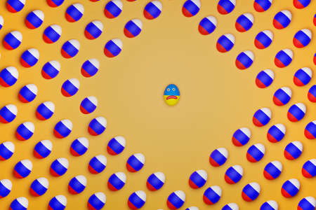 Conflict between Russia and Ukraine. Eggs painted in the colors of the flags.の写真素材