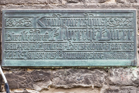 Old historical wall decor plate in Gent, Flanders, Belgiumの写真素材