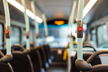 Stop button inside double decker bus, Londonの写真素材