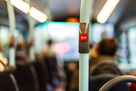Stop button inside double decker bus, London