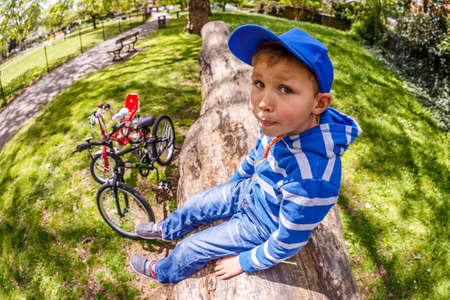 School boy at his bikeの写真素材