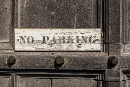 No parking sign on wooden door, Englandの写真素材