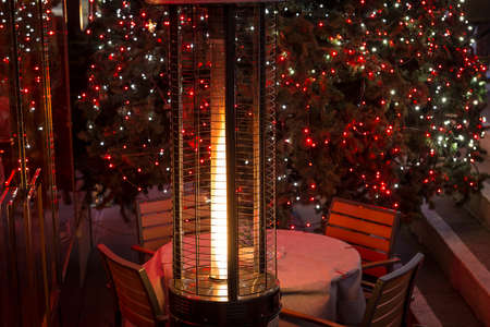 Cozy table on the street in Christmas time, Londonの写真素材