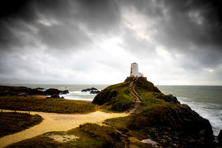 A view of Ynys Llanddwyn,  a small tidal island off the west coast of Anglesey, northwest Wales, UKの写真素材