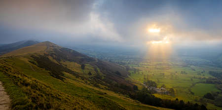 View of Mom tor in Peak district, an upland area in England at the southern end of the Pennines, UKの写真素材