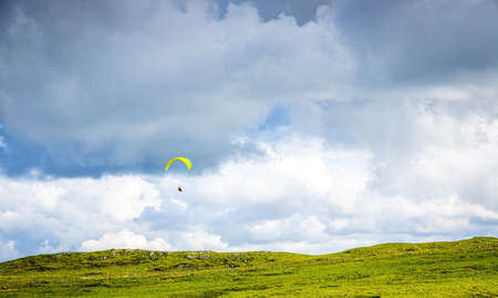 Paragliding in Peak district, an upland area in England at the southern end of the Pennines, UKの写真素材