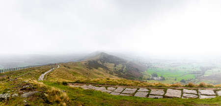 View of Mom tor in Peak district, an upland area in England at the southern end of the Pennines, UKの写真素材