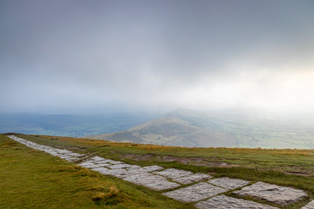 View of Mom tor in Peak district, an upland area in England at the southern end of the Pennines, UKの写真素材