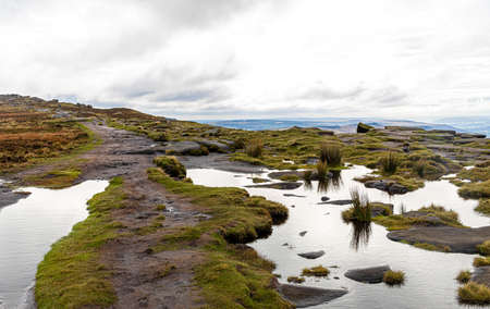 View of Stanage Edge in Peak district, an upland area in England at the southern end of the Pennines, UKの写真素材
