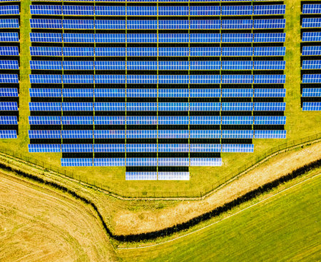 Aerial view of solar batteries field in english countryside, UKの写真素材