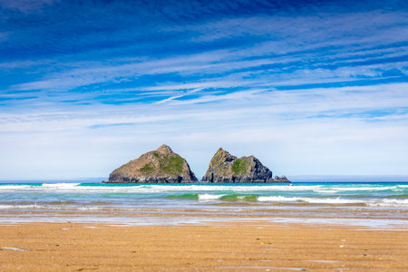 Gull rocks on sunny day in Hollywell Bay in Cornwall, UKの写真素材